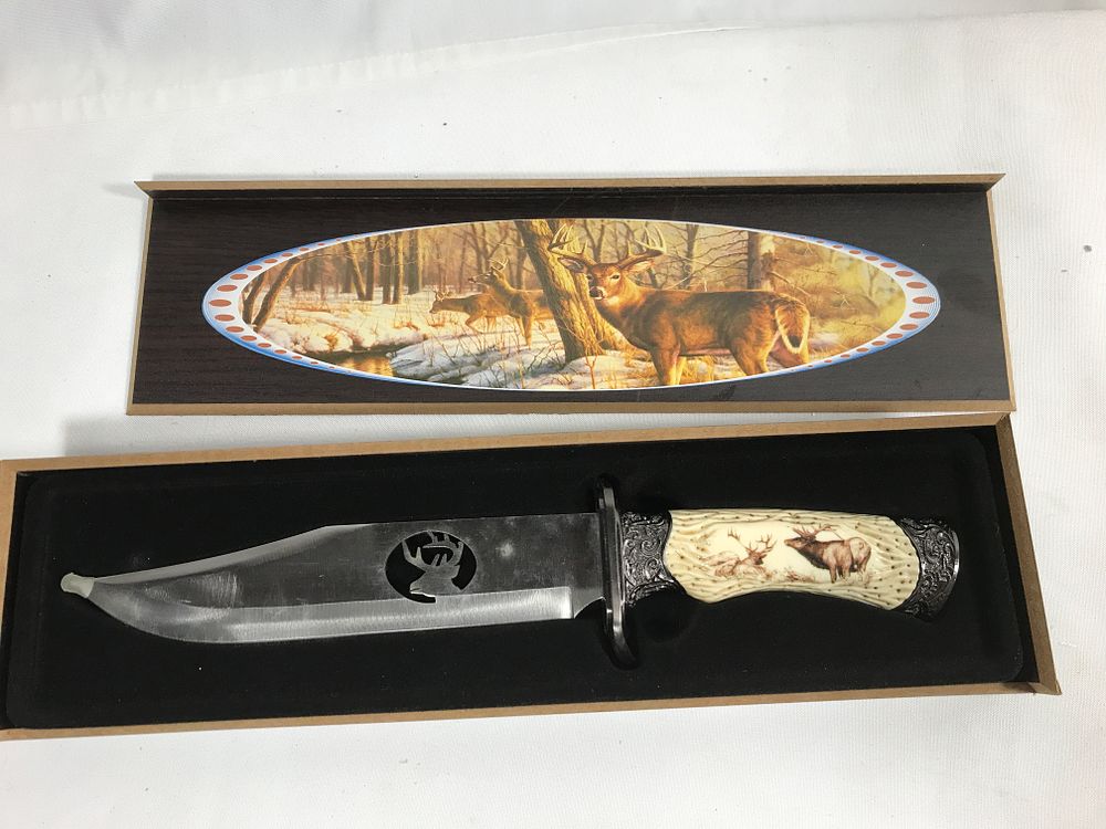 Lot 181: Buck Motif Hunting Knife in org case