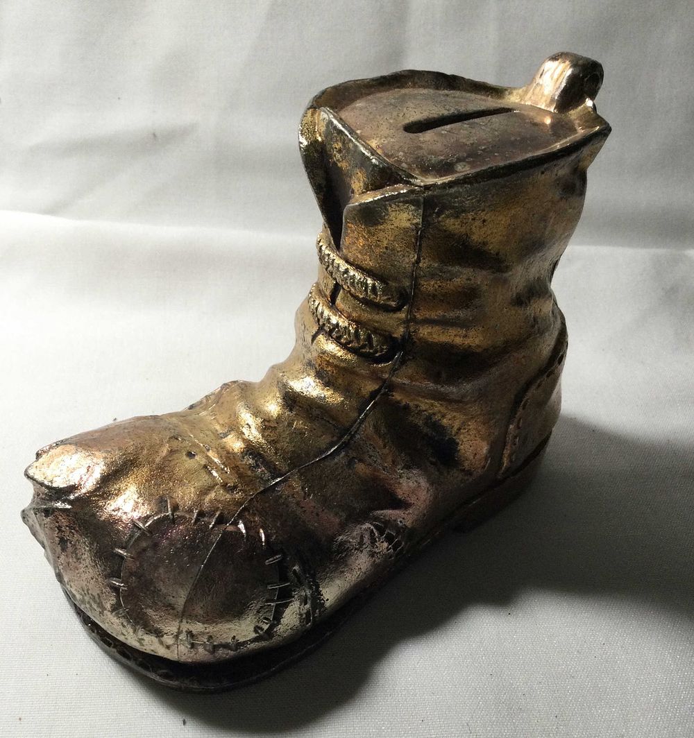 Lot 221: Brass Plated Shoe Coin Bank