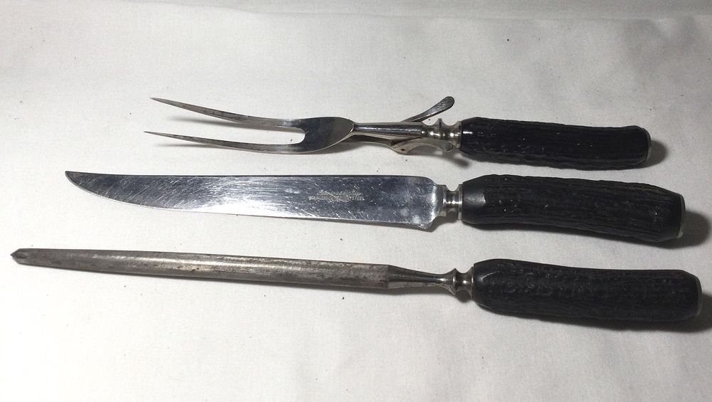 Lot 222: Three-piece Carving Knife, Fork and Sharpener