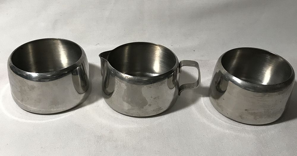 Lot 242: Delta Airlines Stainless Steel Creamer w/ Cups