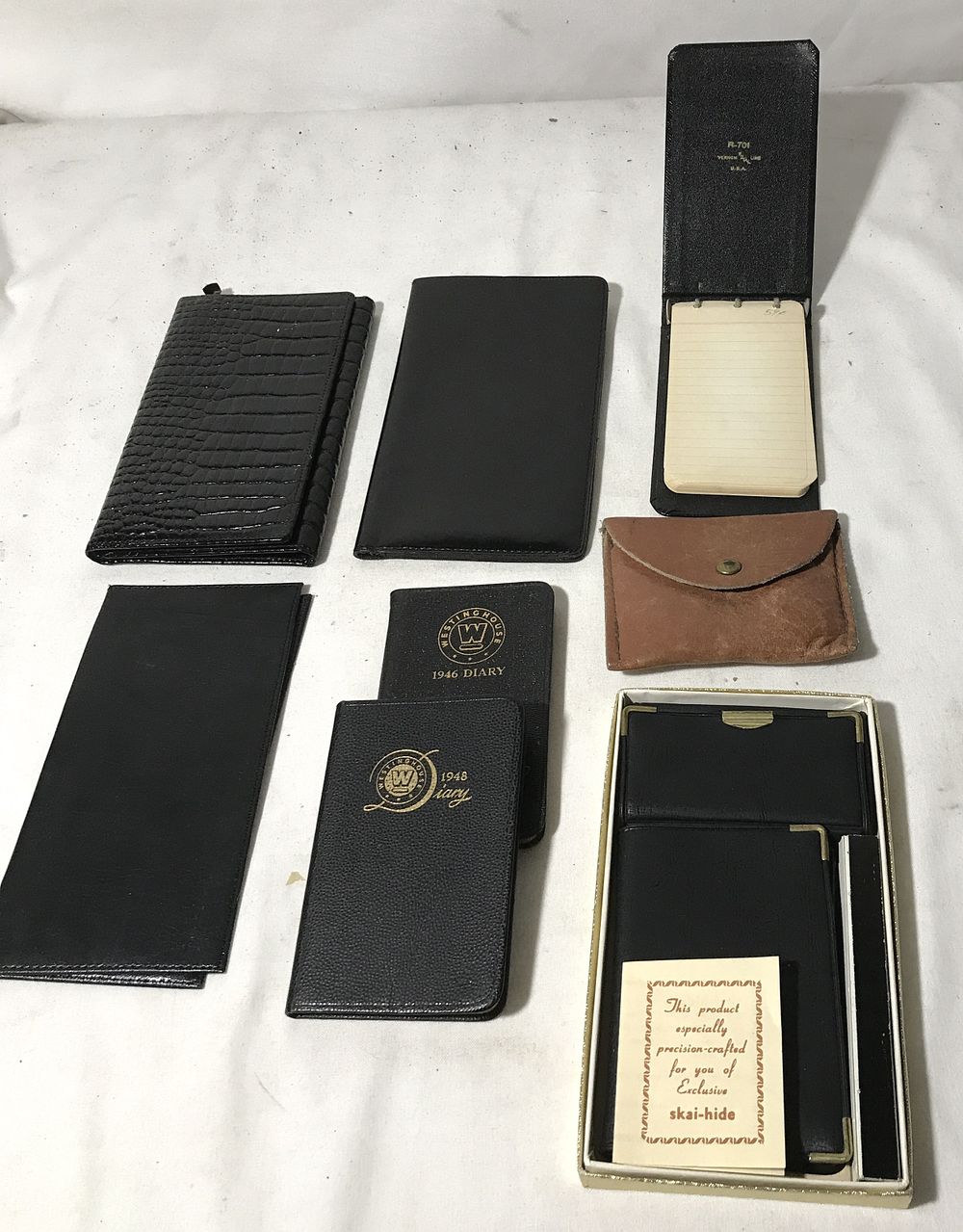 Lot 176: Billfolds, Westinghouse Diary, Leather Pouch,