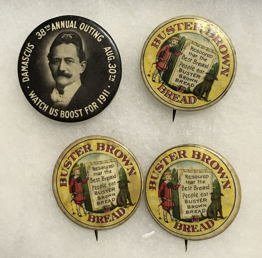 Lot 183: Early 1900s Buster Brown Bread Buttons &