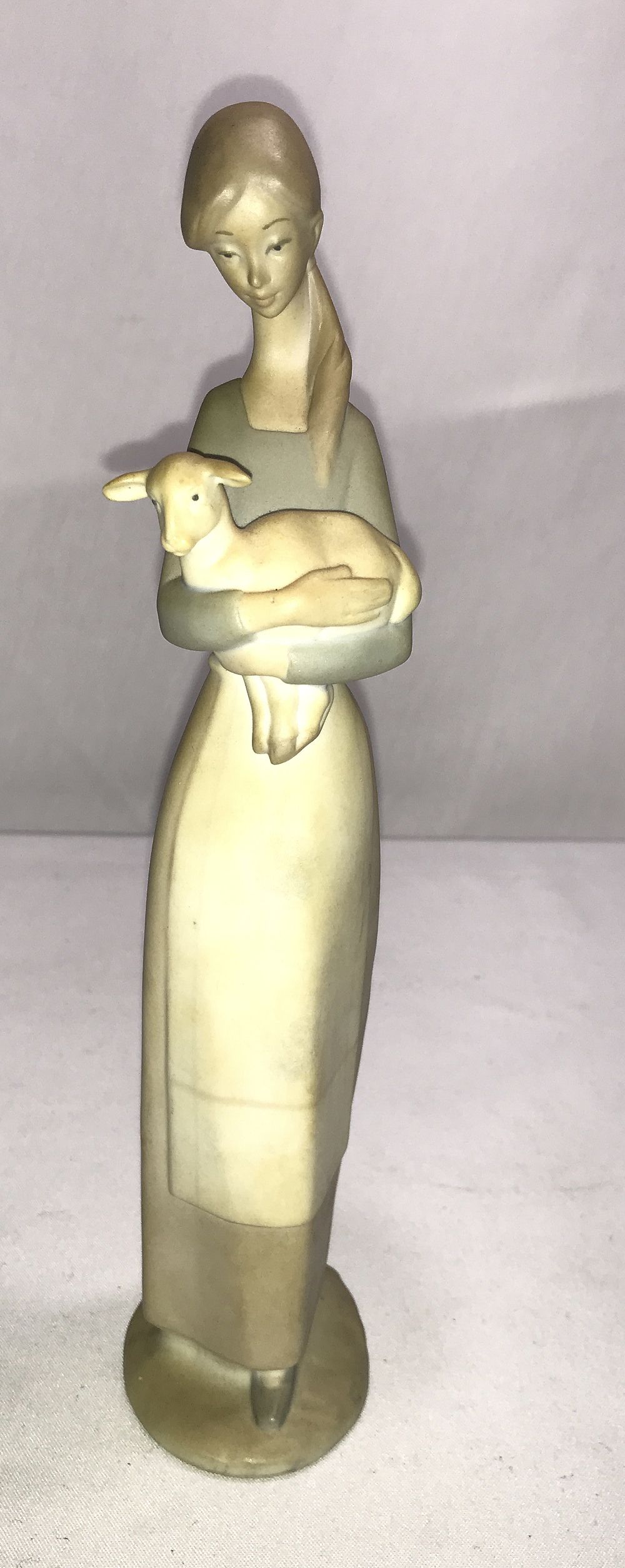 Lot 159: Lladro Statue - Woman Holding Lamb