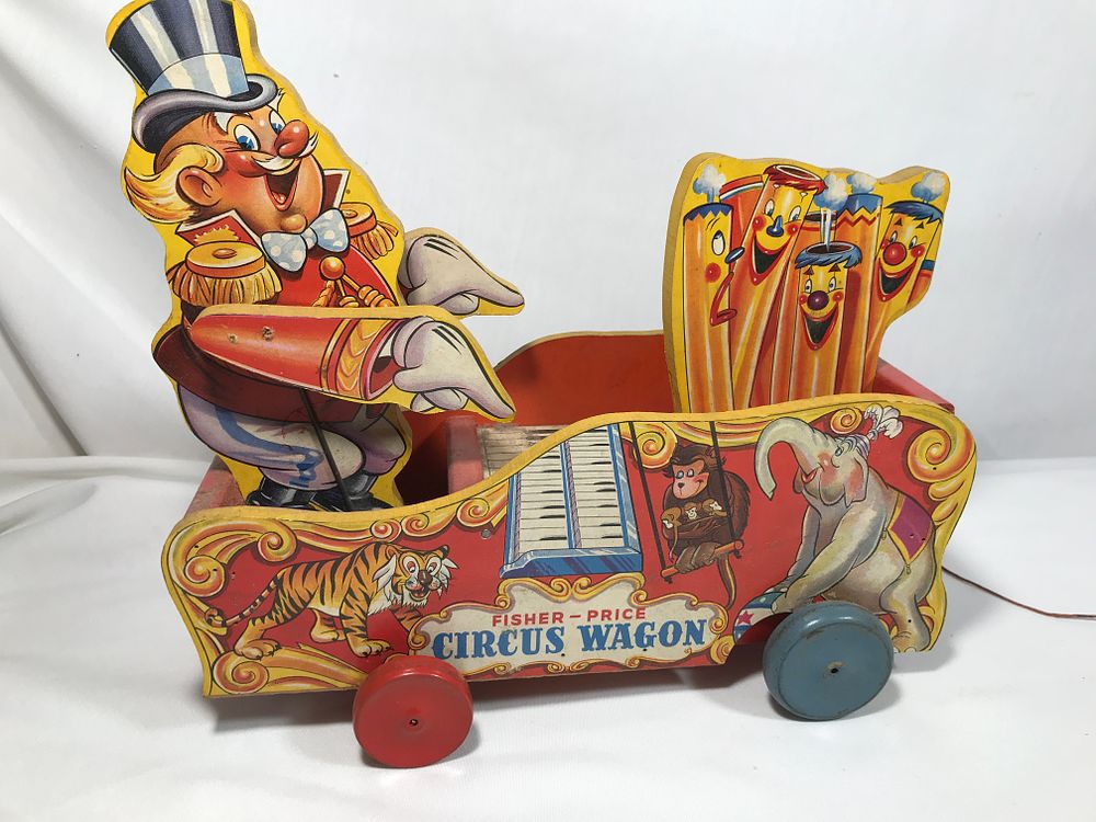 Lot 267: Vintage Fisher Price Circus Wagon Pull Toy