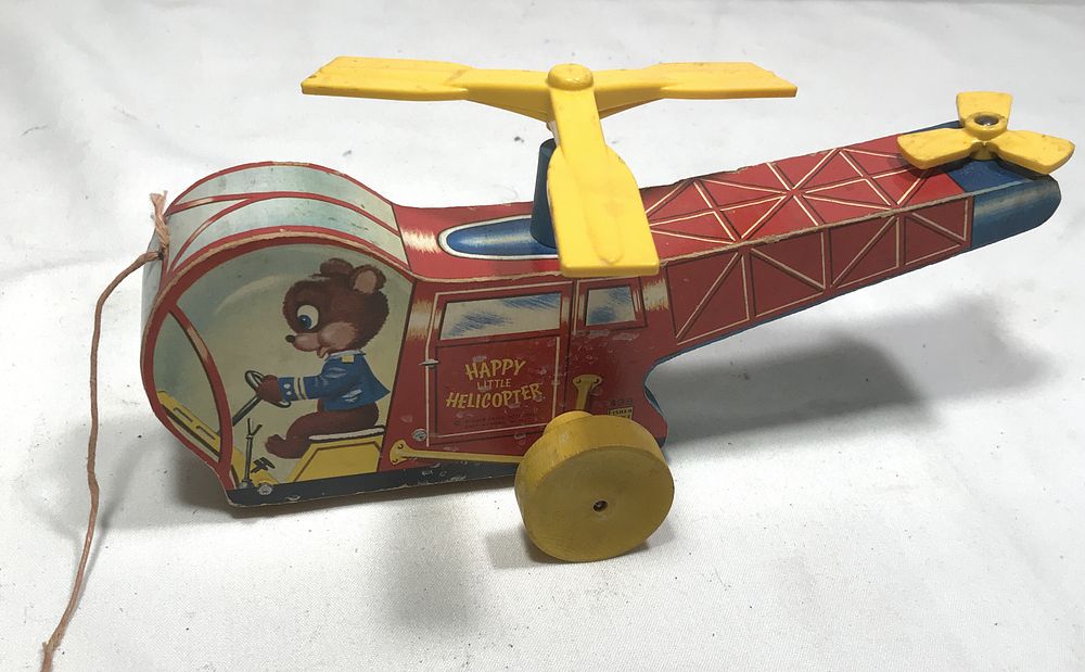 Lot 278: Fisher Price Happy w/ Helicopter Pull Toy