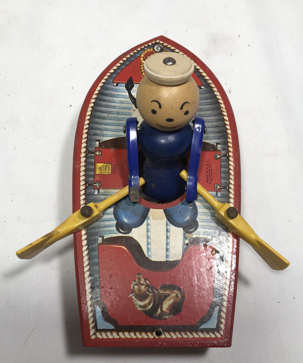Lot 279: Fisher Price Wooden Boat Toy on Wheels