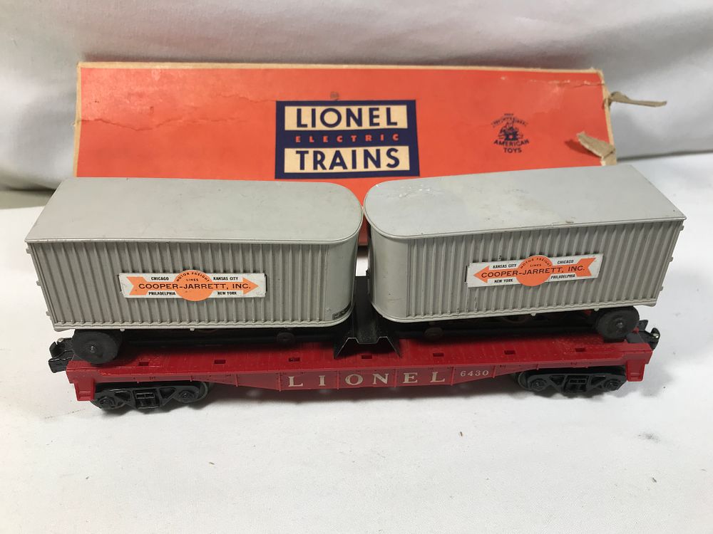 Lot 189a: Lionel 6430 Flat Car w/ Cooper Jarrett Trucks