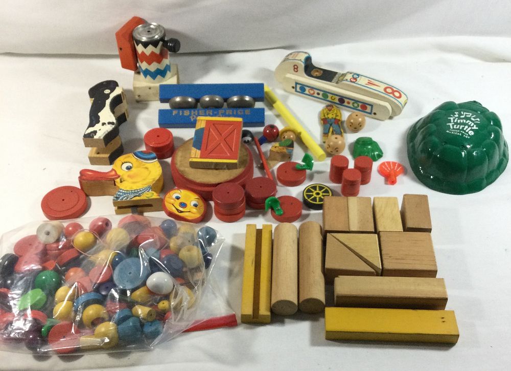 Lot 332: Fisher Price Vintage Toy Pieces & Parts