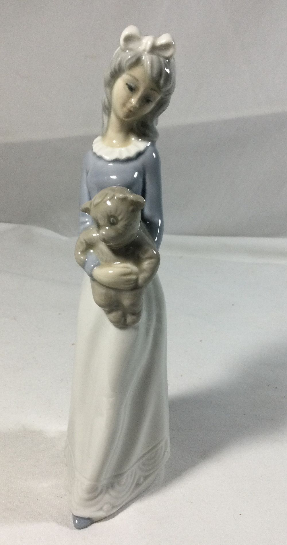 Lot 359: TENGRA  Figurine of Girl w/ Teddy Bear