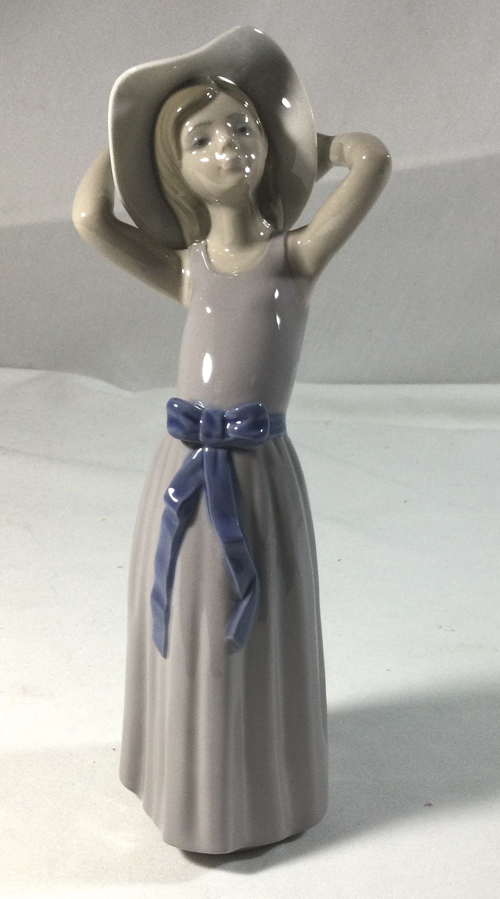 Lot 360: LLADRO Coy Girl with Straw Hat