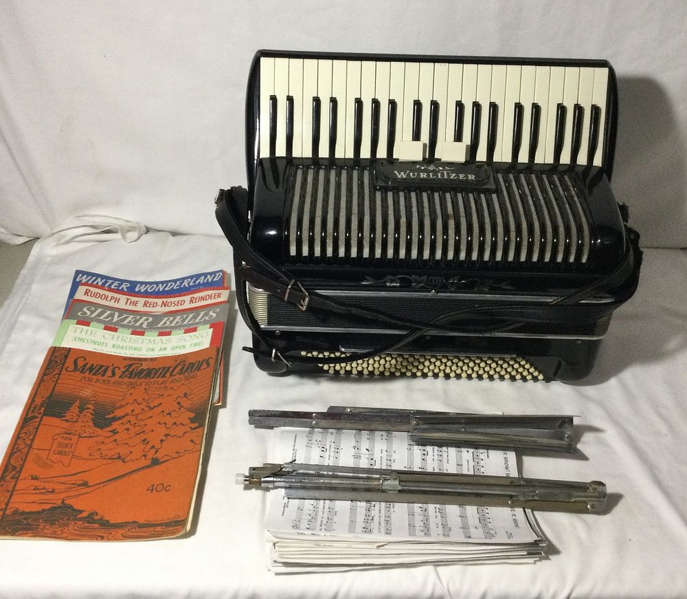 Lot 427: Vintage Wurlitzer 1030 Accordion Black with Case