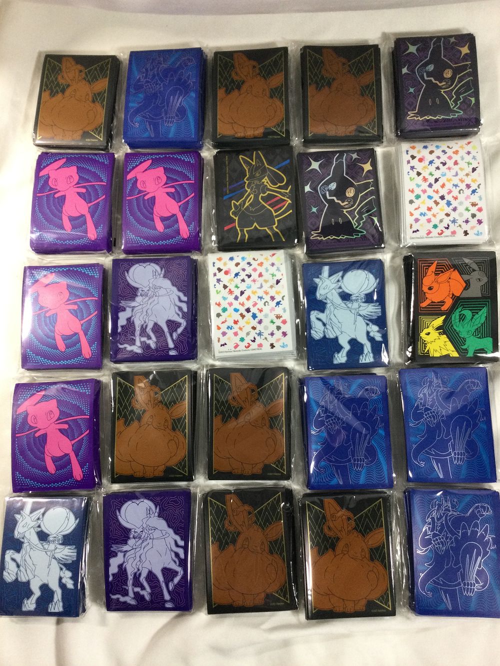 Lot 407: Pokémon Card Sleeves New! 25 packs