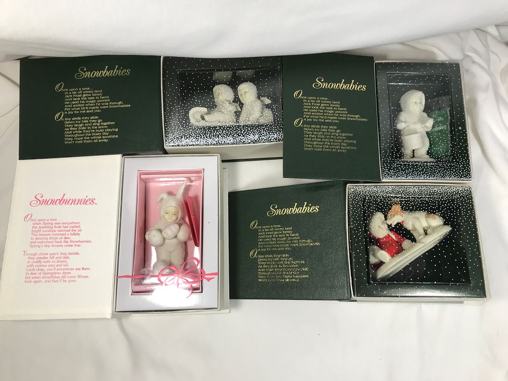 Lot 390: Dept 56 Snowbabies Collection in org boxes