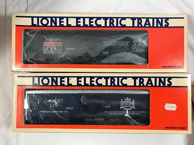 Lionel Seagrams Vodka & Calvert Gin Reefers (2). Both are new in the boxes, #6-9841 & 6-9846