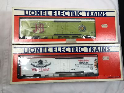 Lionel DeWars and J & B Billboard Reefers (2). Both new in original boxes, # 6-9829 & 6-9828