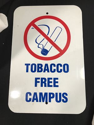 Vintage Tabacco Free Campus Metal Sign. Measures 18 x 12 inches