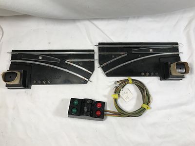 Set of American Flyer Remote Switches w/ Remote. Left & Right track switches, Appears to be in 