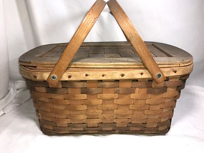 Vintage Woven Picnic Basket. Measures 19 x 12 1/2 x 9 1/2 inches