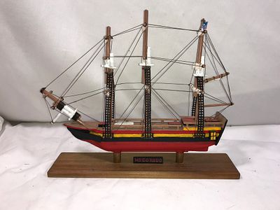 Wood Hand Painted Ship HO DO RODO. Measures approximately 13 inches long by 10 inches tall by 2 