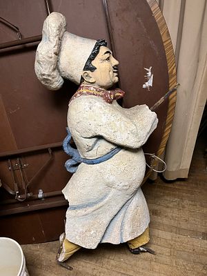 Italian Chef or Fat Chef Display. Appears to be made of a thick plaster with metal bars on the 