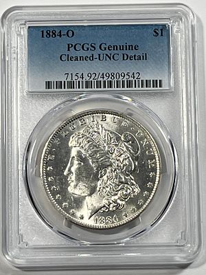 1884 O Morgan Dollar PCGS AU Detail. Genuine Cleaned