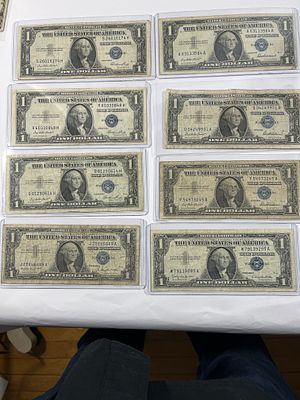 Silver Certificate Blue Seal Notes (8). All $1, includes: 1935E (3), 1957 (3), a 1957A and 1957B