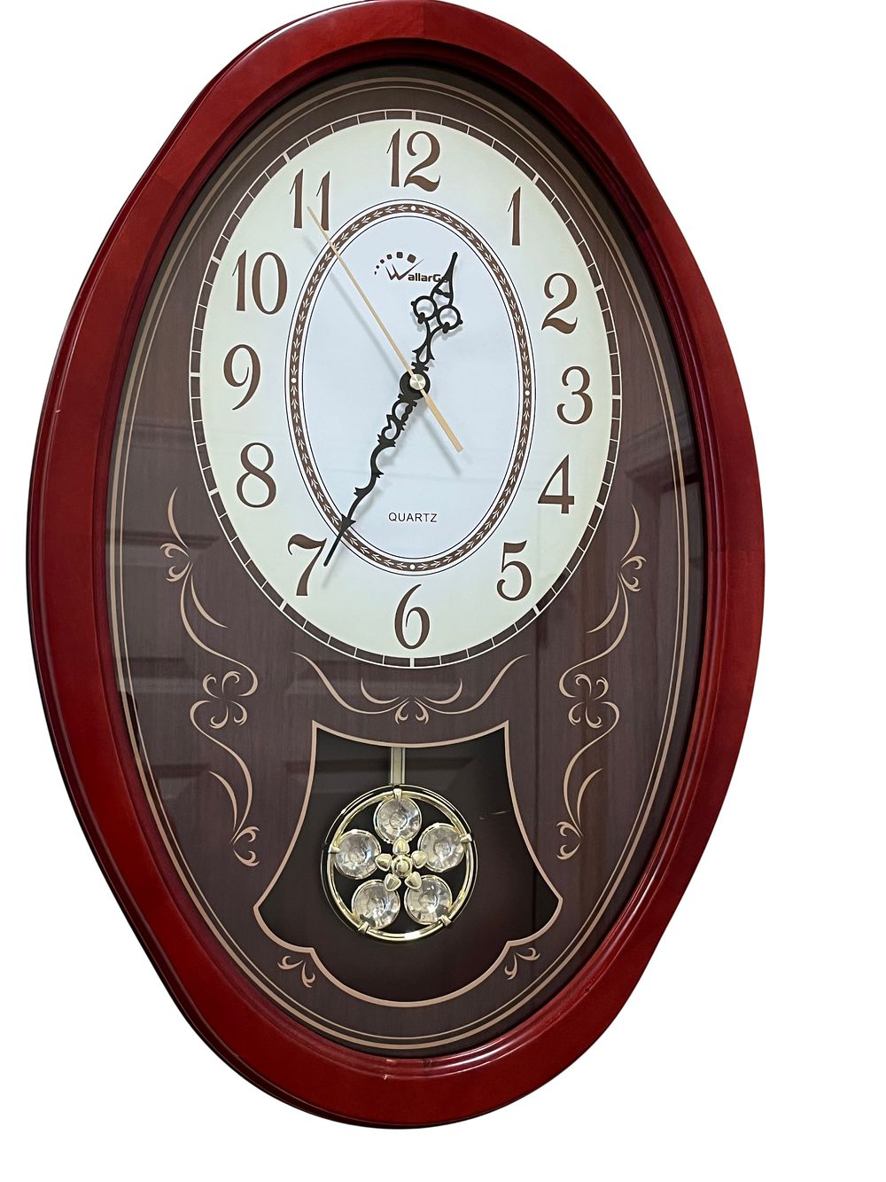 Lot 54: WallarGe Contemporary Oval Musical Motion Quartz Wall Clock