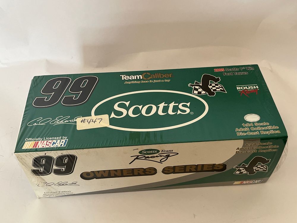 Lot 301g: Team Caliber Carl Edwards #99 Scotts Ford Taurus Die-Cast, 2005 1st Win Edition, 2005