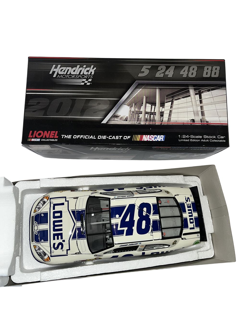 Lot 330q: Lionel Action Racing Collectables Jimmie Johnson #48 Lowe's Dover White Chevrolet Impala Die-cast Stock Car, 2012