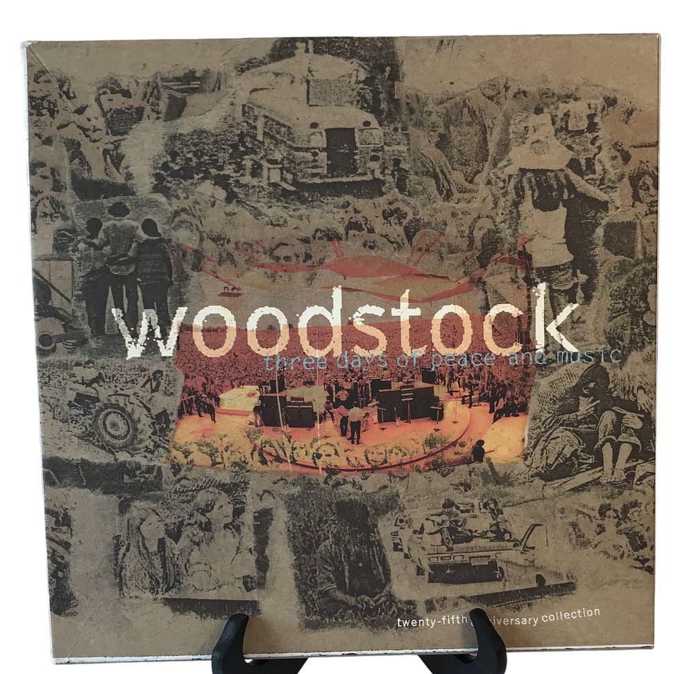 Lot 115: Woodstock Three Days of Peace and Music Twenty-Fifth Anniversary Collection 4-CD Box Set
