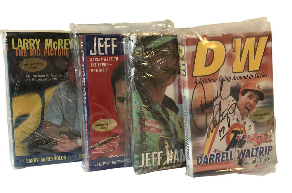Lot 758: Autographed NASCAR Hardcover Books Featuring Darrell Waltrip, Jeff Gordon, Larry McReynolds, and Jeff Hammond