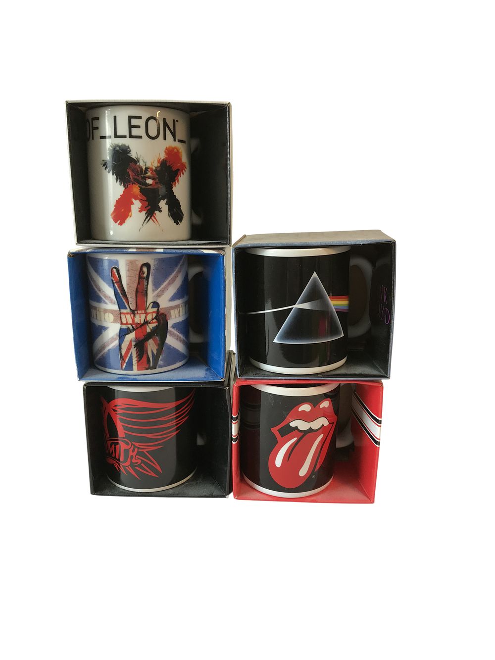Lot 116: A Collection of Five Licensed Rock Band Ceramic Mugs in Original Packaging