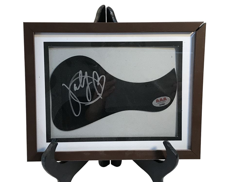 Lot 124: Katy Perry Signed Acoustic Guitar Pickguard with AAA Certification