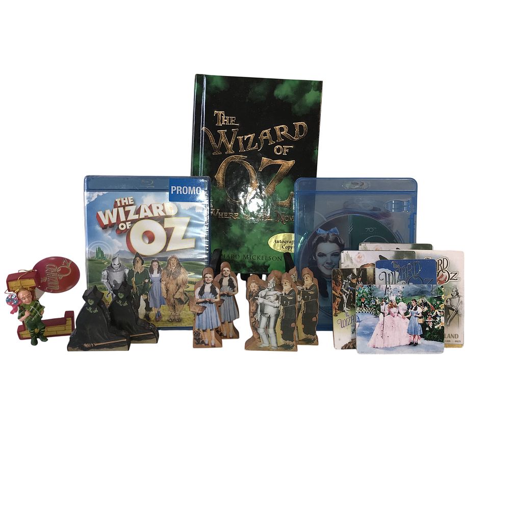 Lot 135: A Collection of The Wizard of Oz Memorabilia Including Autographed Richard Mickelson Book and Sealed Blu-ray