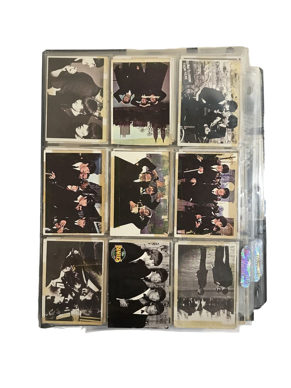 Lot 143: A Collection of 1964 Topps Beatles Trading Cards and Modern Issues