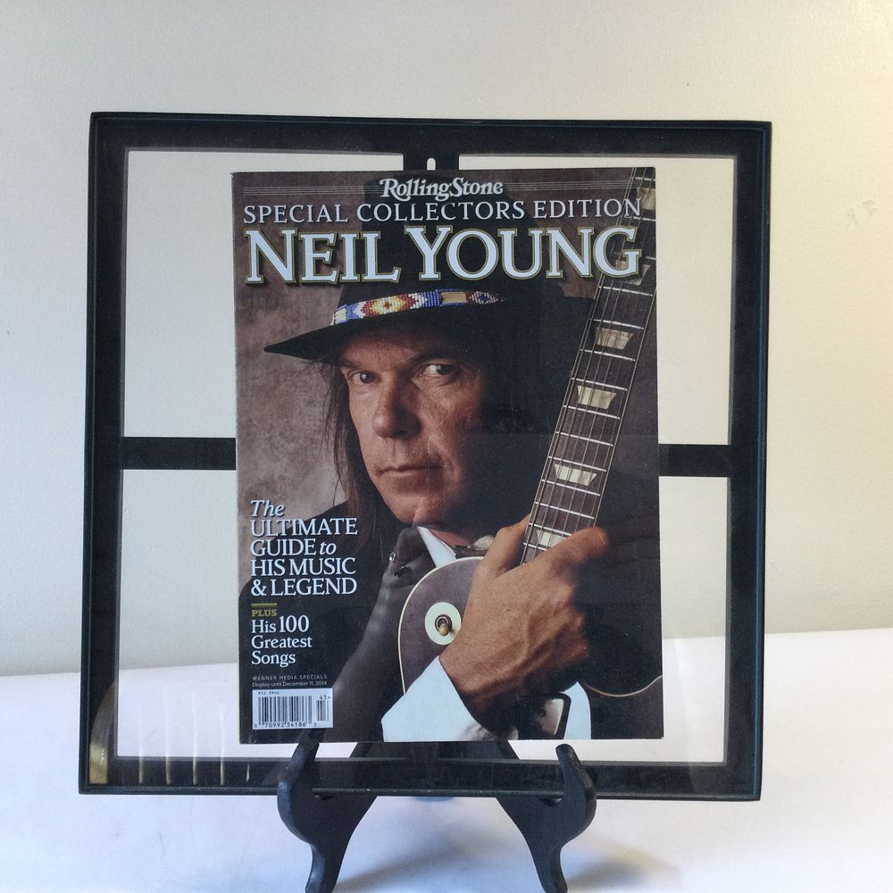 Lot 146: Rolling Stone Special Collectors Edition Neil Young The Ultimate Guide to His Music and Legend Magazine in Floating Frame