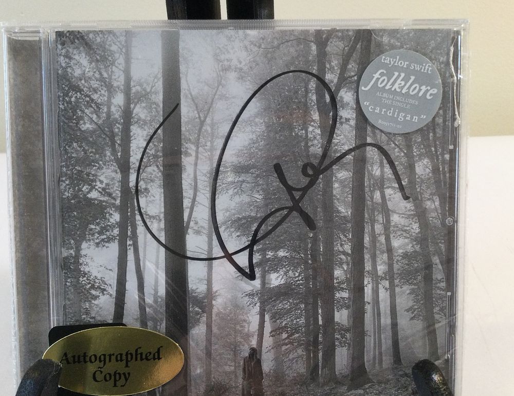 Lot 150: Taylor Swift Signed Folklore Limited Edition In The Trees CD