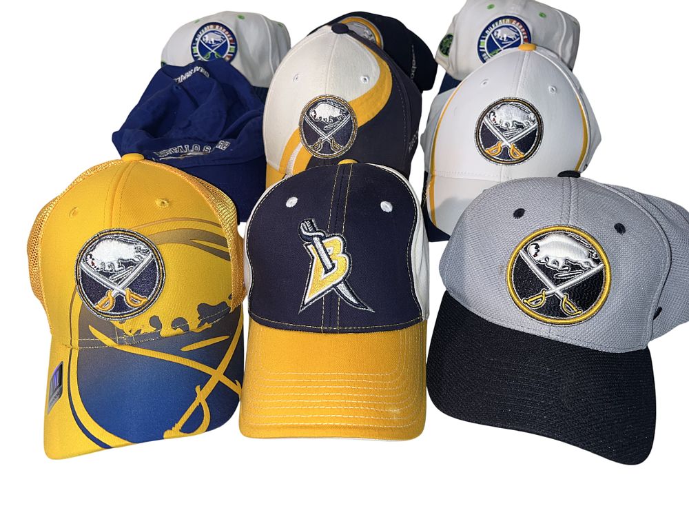 Lot 234: A Collection of Nine Buffalo Sabres NHL Baseball Caps Including Reebok and New Era