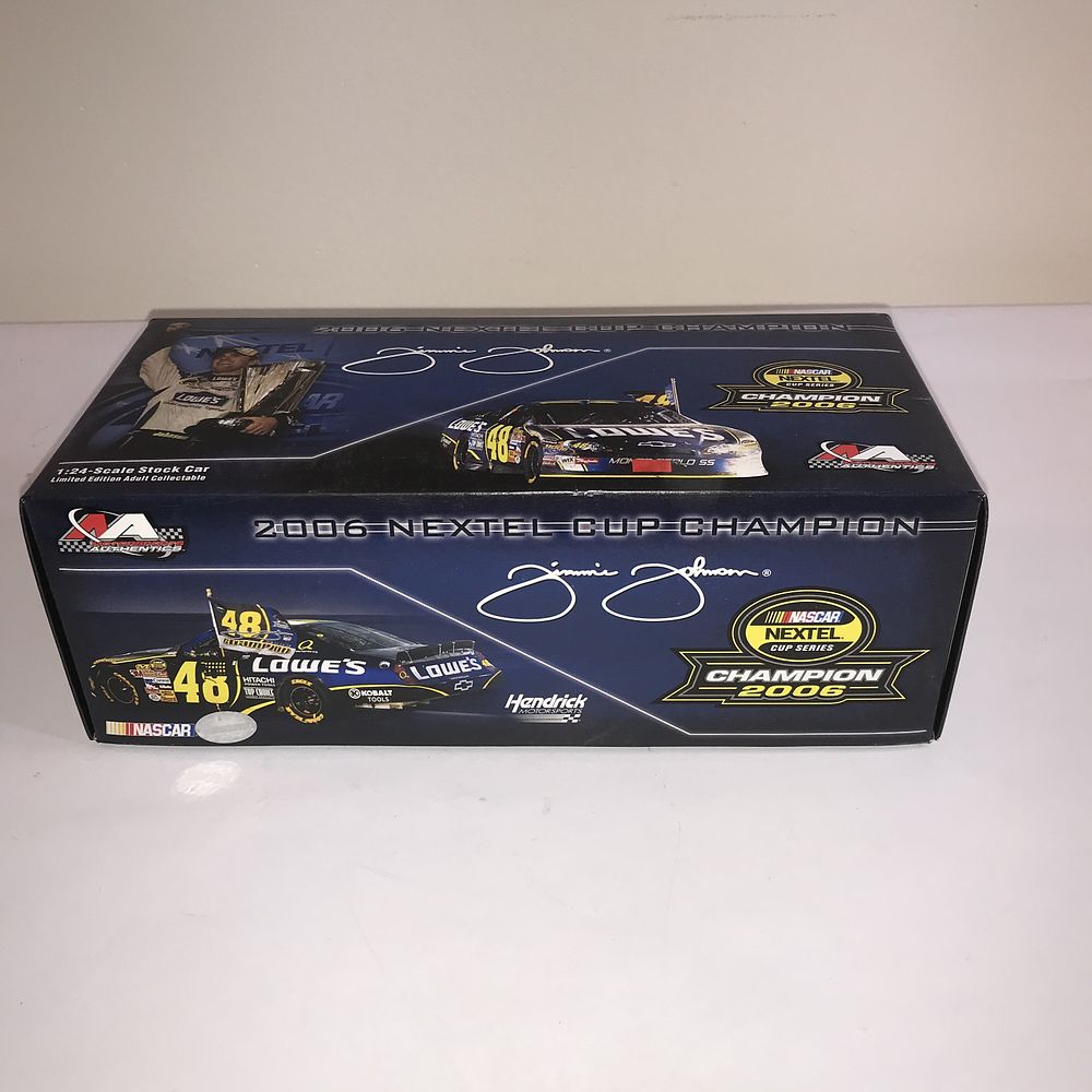 Lot 2514: Motorsports Authentics Jimmie Johnson 2006 NEXTEL Cup Champion 1:24 Scale Die-Cast Stock Car