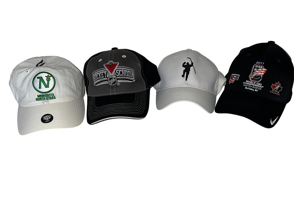 Lot 3008: A Collection of Four Professional and International Hockey Baseball Caps