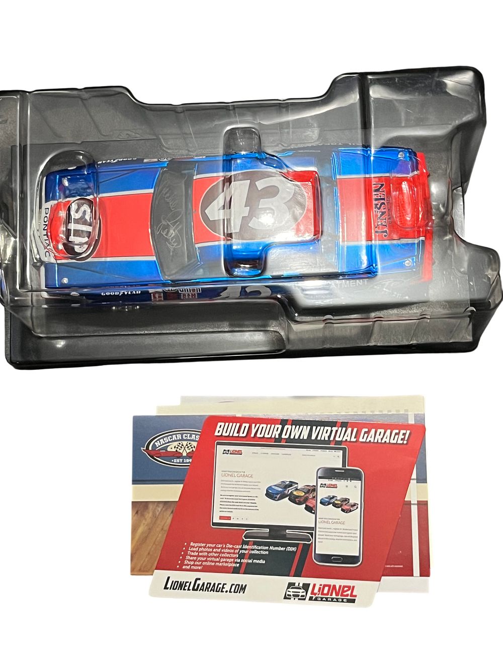 Lot 411: Lionel Racing Richard Petty #43 STP 1984 Pontiac Grand Prix Firecracker 400 200th Win Autographed Liquid Color