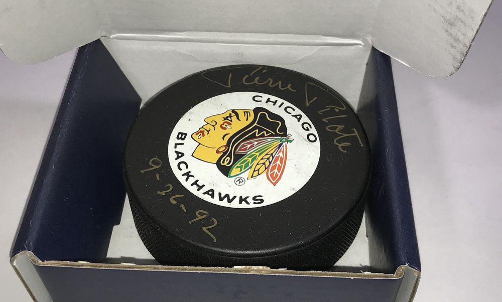 Lot 241l: Pierre Pilote Autographed Chicago Blackhawks Puck