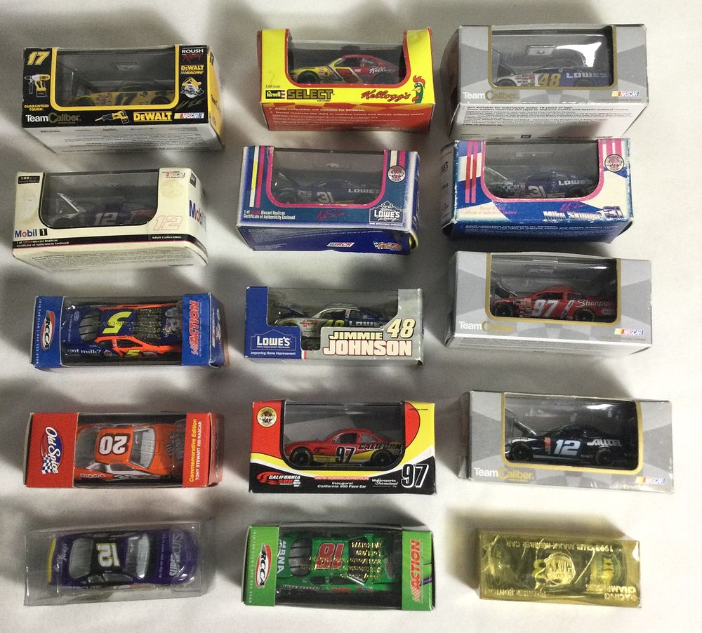 Lot 1257: Sealed 1:64 Scale Die Cast Racing Cars (15)