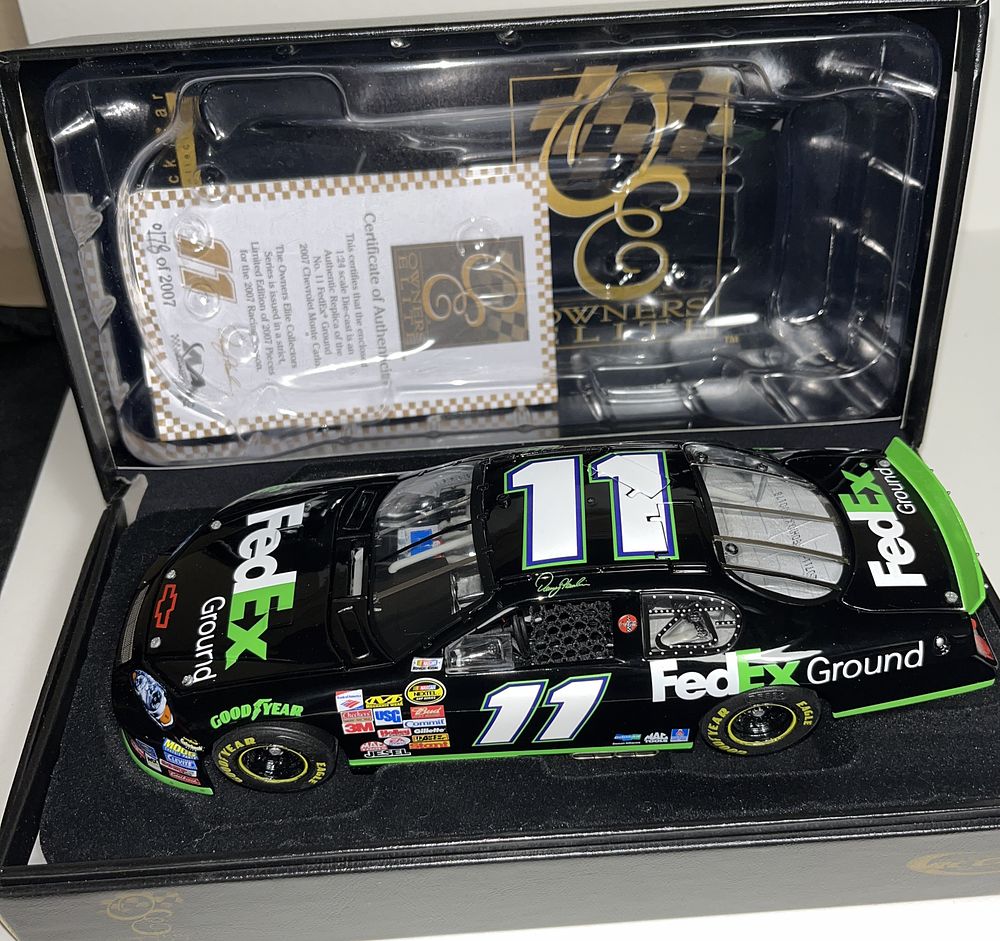 Lot 570: Denny Hamlin #11 FedEx Die Cast Car in org box