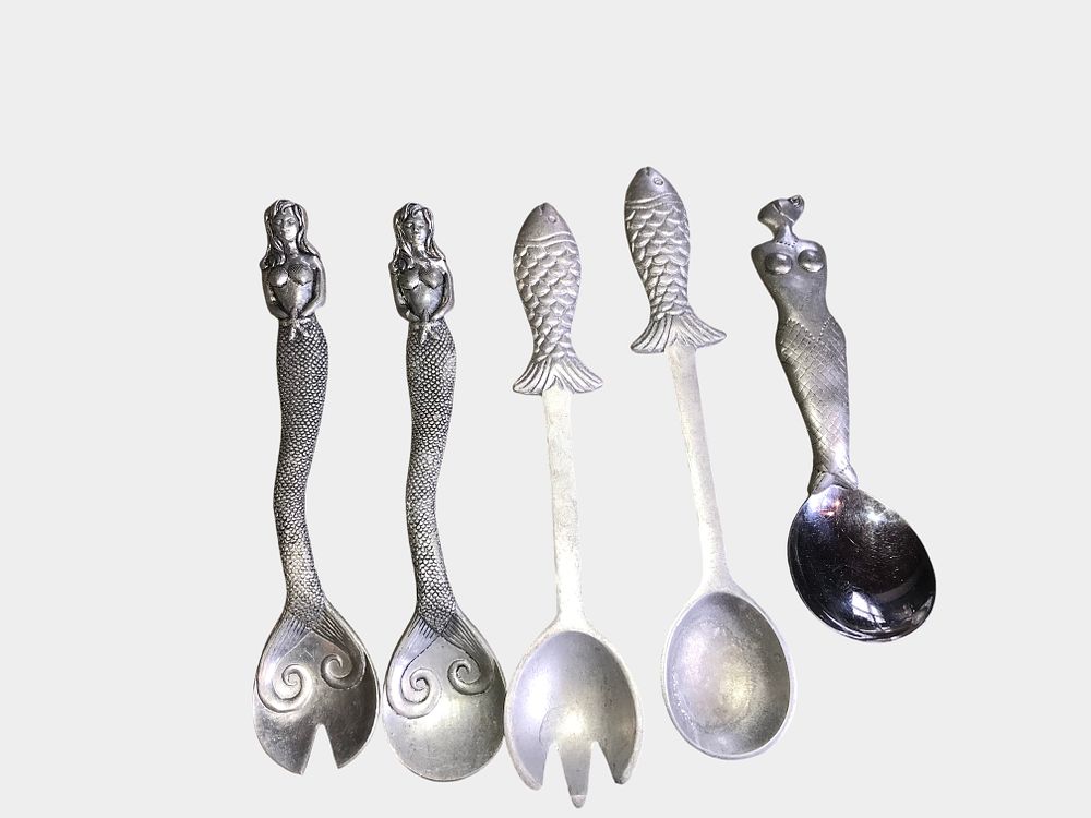 Lot 65: A Group of five Cast Aluminum Coastal Theme Serving Utensils Including Mariposa