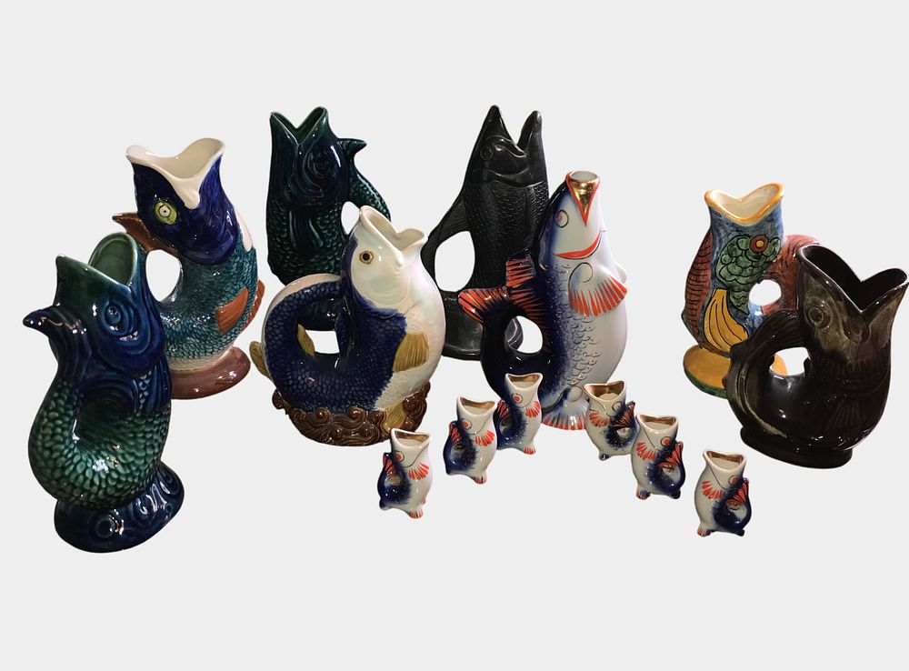Lot 74: A Collection of Fifteen Ceramic Fish-Form Gluggle Jugs and Drinking Vessels