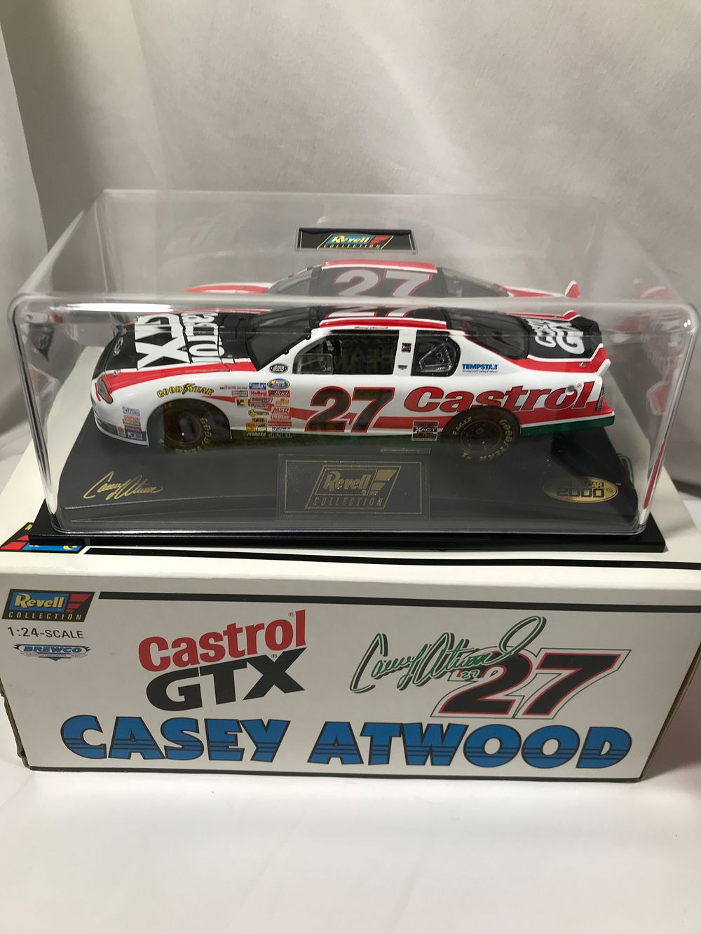 Lot 809: Two Diecast race cars in org packaging