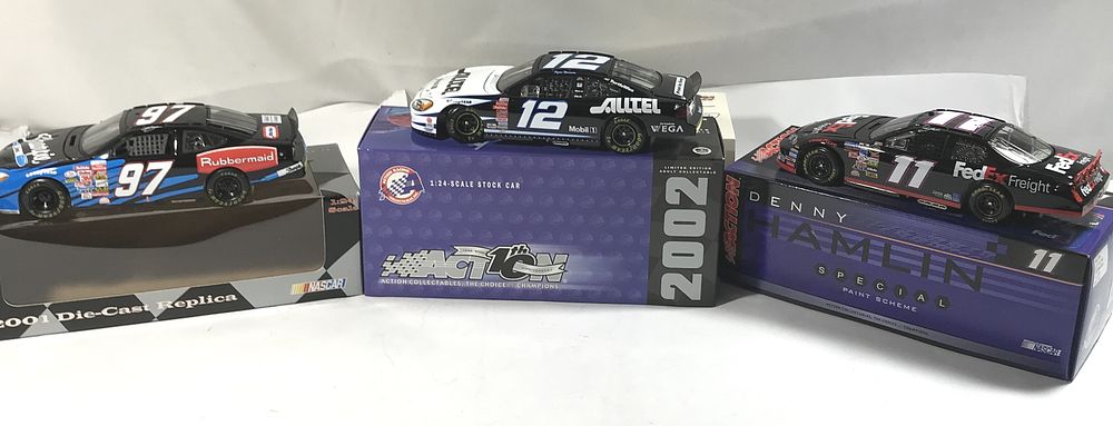Lot 831: 3 NASCAR Diecast Collectible Race Cars