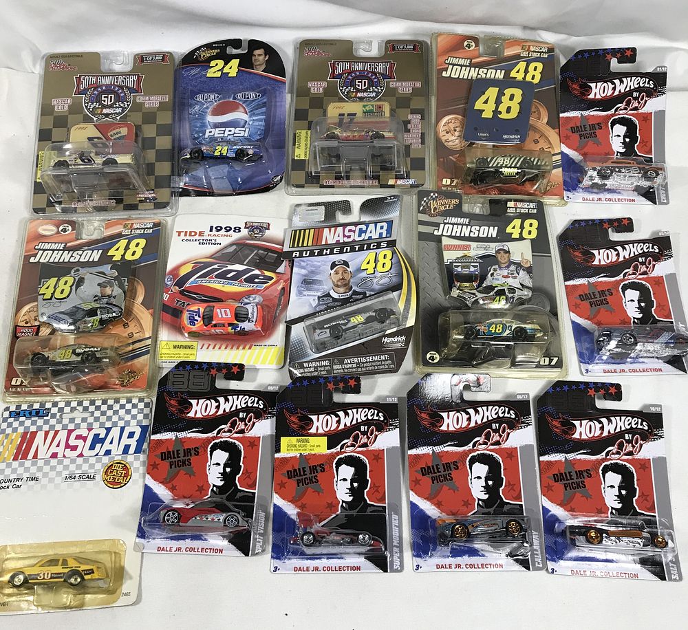 Lot 1304: 15 Diecast Racing Cars, all sealed in packages