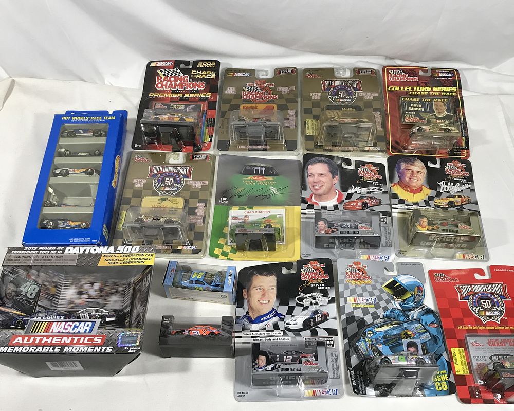 Lot 1306: 20 Diecast race cars all sealed in packages